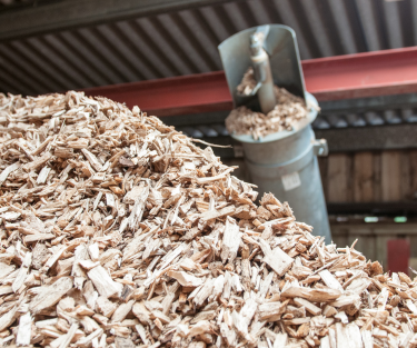 Wood pellets burning with a bright flame