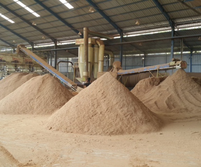 Wood pellets burning with a bright flame